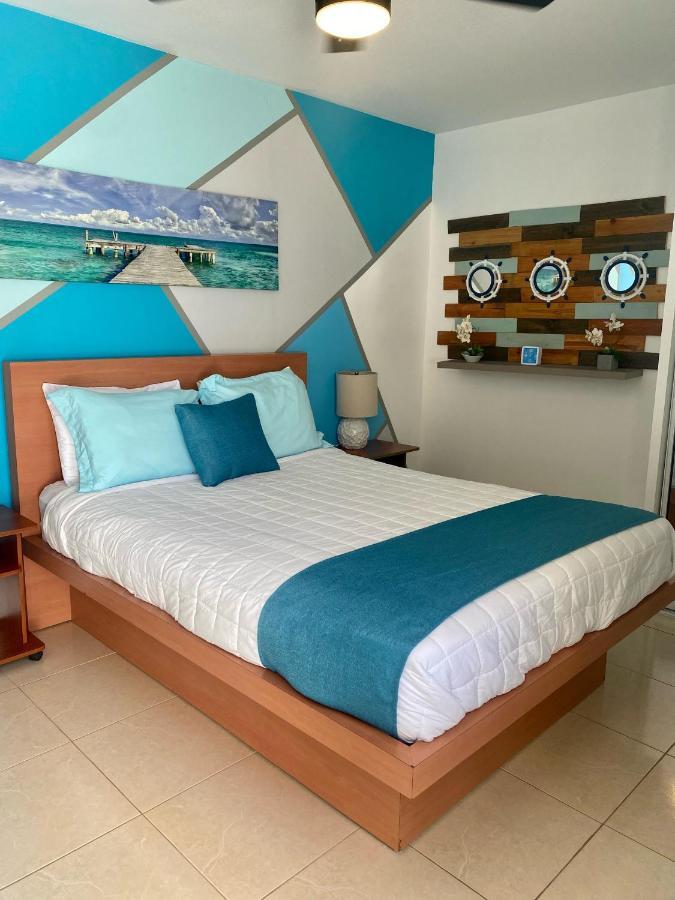 Aqua Marina Beach Club รินกอน ภายนอก รูปภาพ