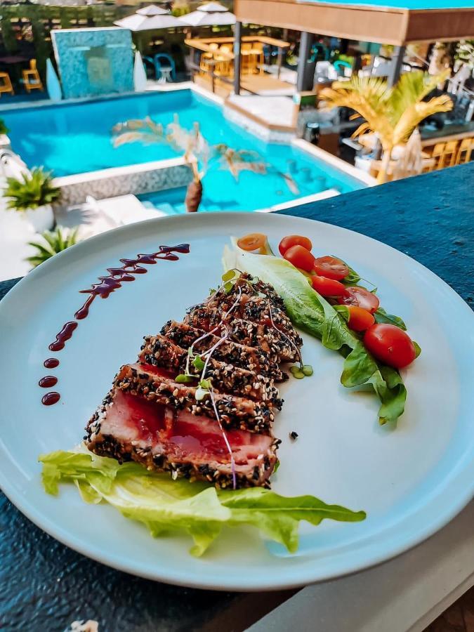 Aqua Marina Beach Club รินกอน ภายนอก รูปภาพ